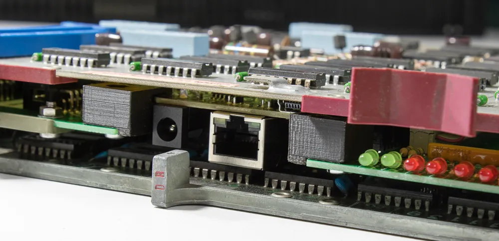 The card fitted into a backplane, the BeagleBone hovering in its cutout